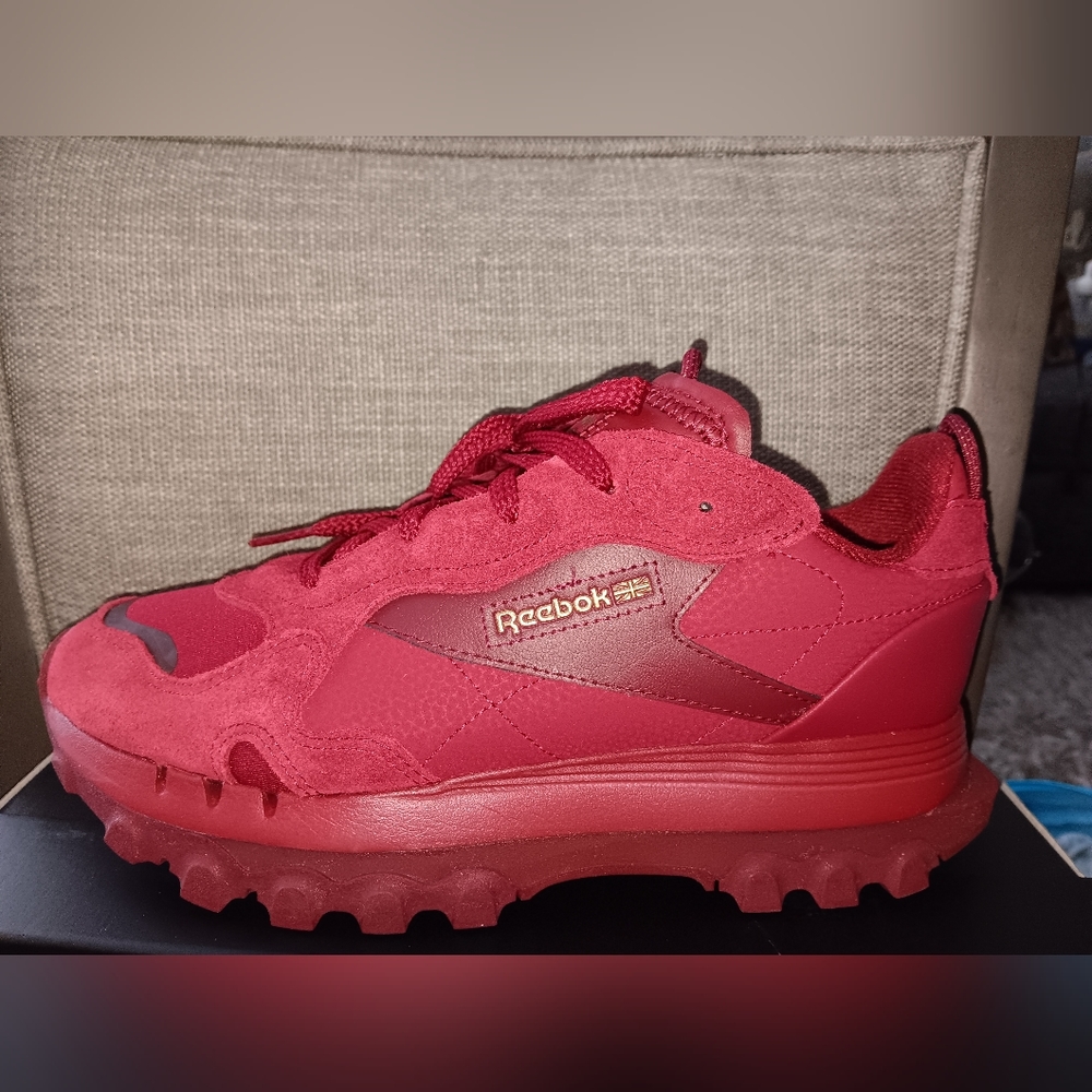 Reebok Red and Gold Athletic Shoes Sleek Design